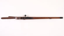 Load image into Gallery viewer, Tikka M590 in 243 Win Fullstock-left handed stock