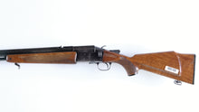 Load image into Gallery viewer, Tikka 70 combo gun in 12GA - 222 Rem.

