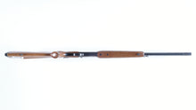 Load image into Gallery viewer, Tikka 70 combo gun in 12GA - 222 Rem.
