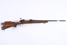 Load image into Gallery viewer, Remington 700 in 6.5x55 SKU: 22563
