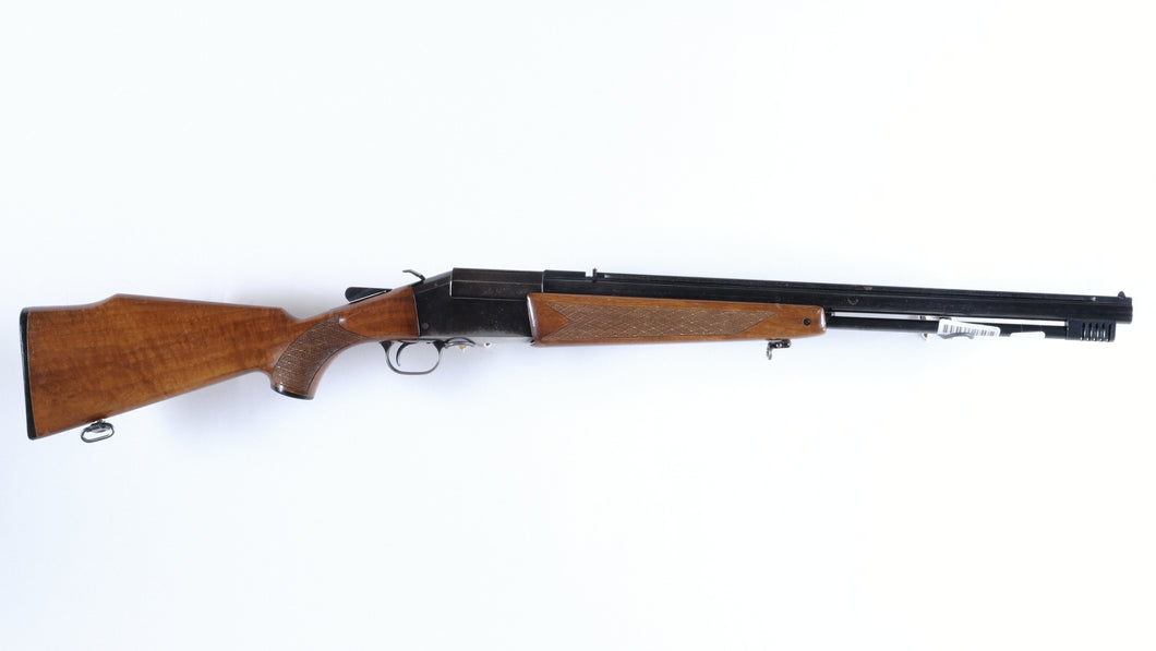 Tikka 70 combo gun in 12GA - 222 Rem.